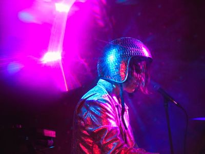 Glowing purple lines showing focused energy and modern lifestyle